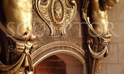Fireplace with angels, sculpture from gypsum